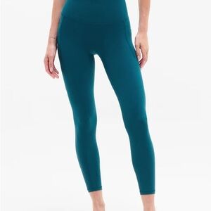 Athleta Stash Pocket Salutation Tight